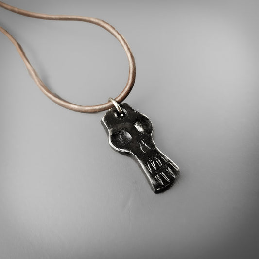 Long Forged Skull Pendant