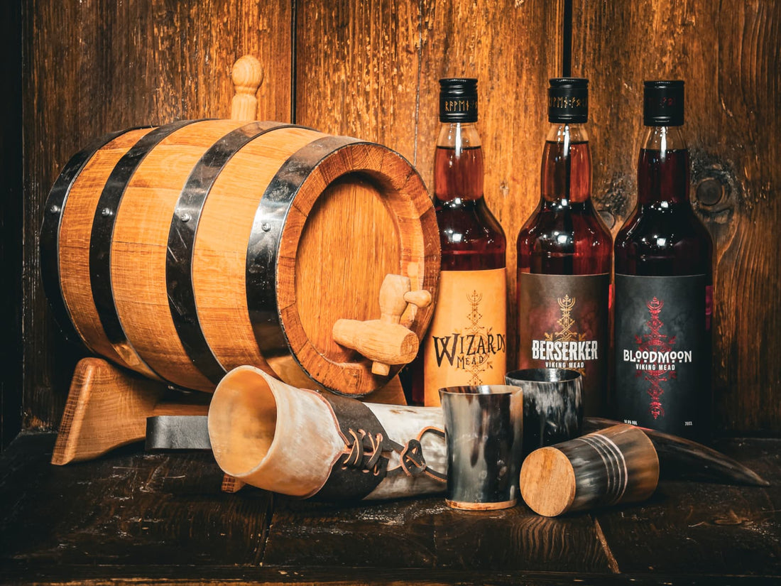 Oak mead barrel with Wizards, Berserker and Bloodmoon mead bottles and drinking horns
