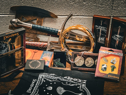 Lord of the Rings gifts including a sword replica, the One Ring, an Elven leaf brooch, enamel pins, bookmarks and a Middle-earth bandana